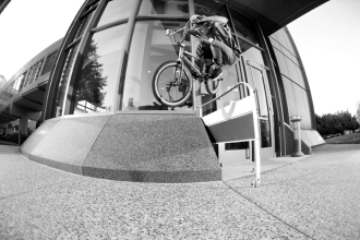 Reed Stark with a rail hop to bank in Minneapolis, MN. We met up downtown to cruise around and look for some photo spots one evening with about an hour's worth of usable light left. High hop, glossy marble bank, no problem for Reed.
